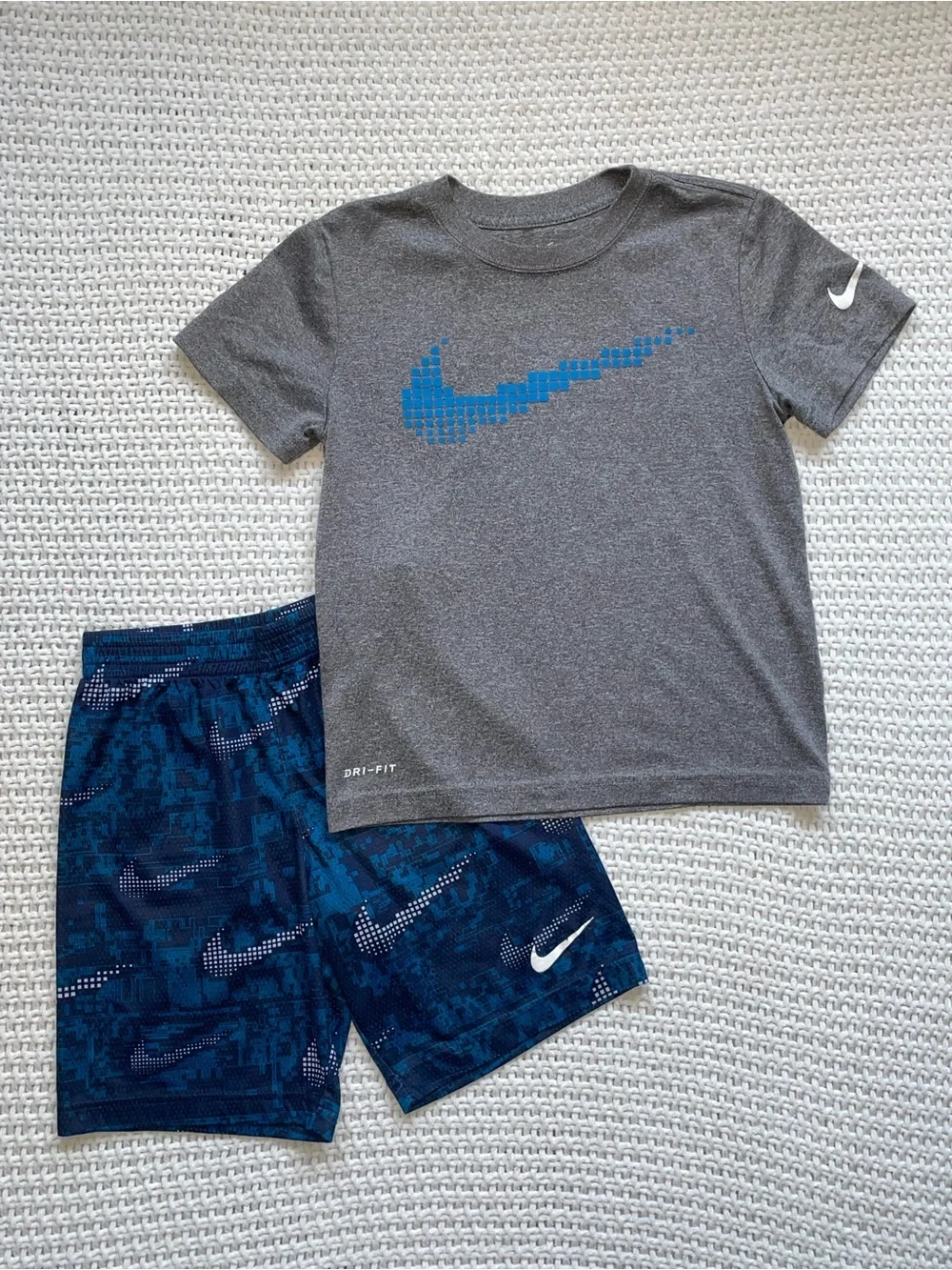 Nike Gray Tee with Blue Pixel Swoosh & Navy Patterned Shorts